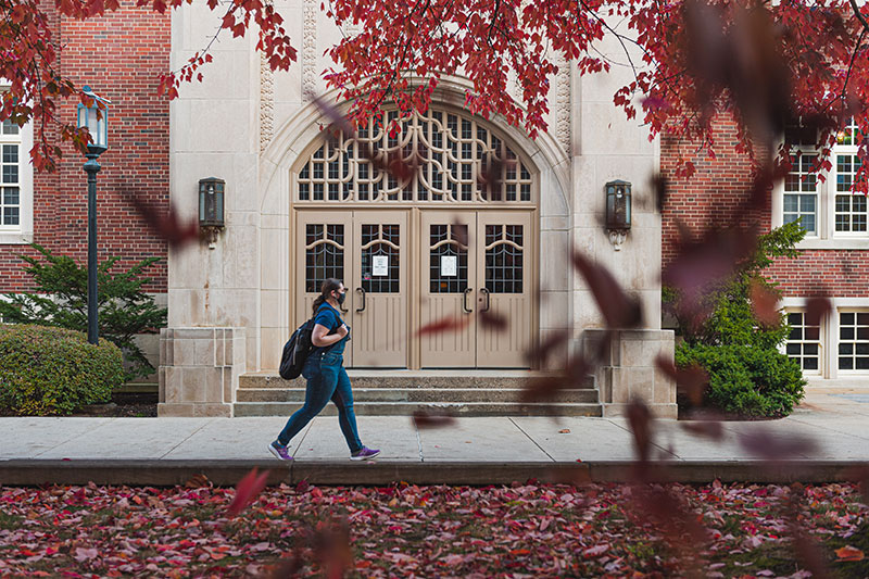 student walking on campus