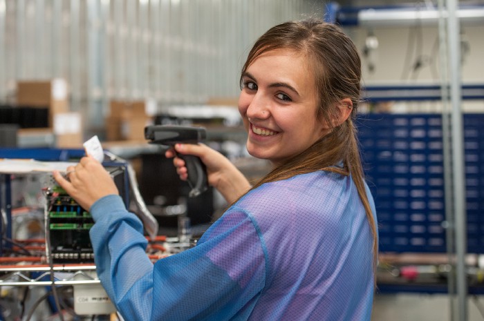 SEL employee working in the lab