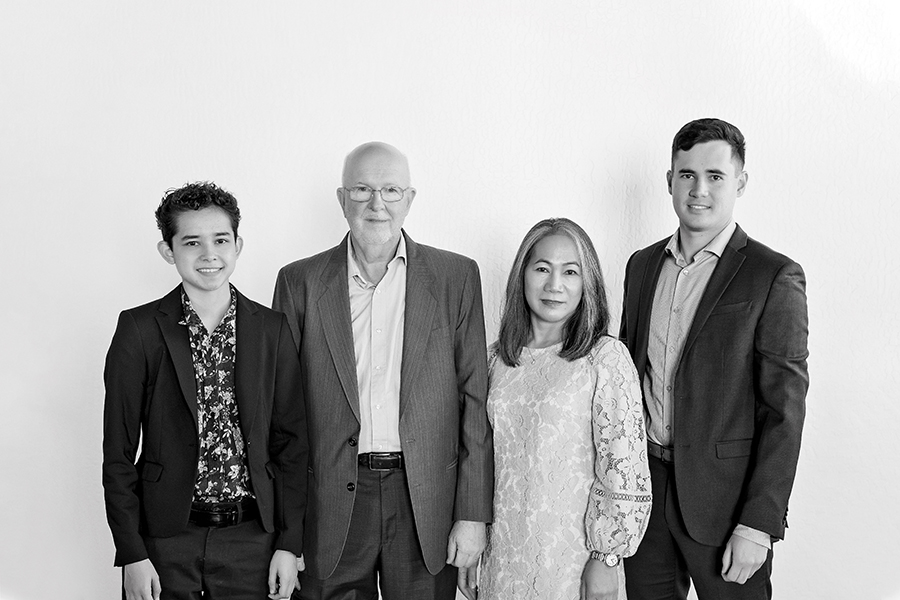 a black and white photo of Ash, Max W, Maileen, and Max G Brown
