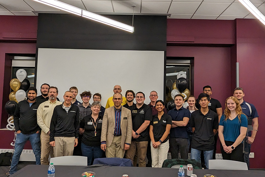 Corporate representatives and ECE Corporate Partner Program staff gather for a group photo.