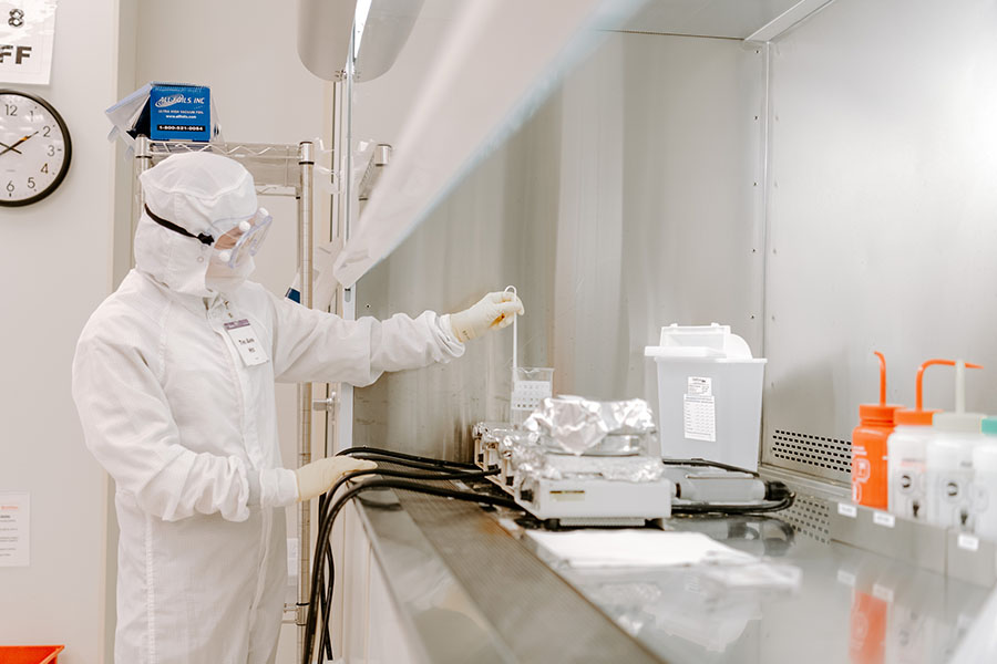A worker performs tasks related to semiconductor manufacturing in the clean room at Birck Nanotechnology Center.