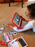 Young Girl Plays with Kit