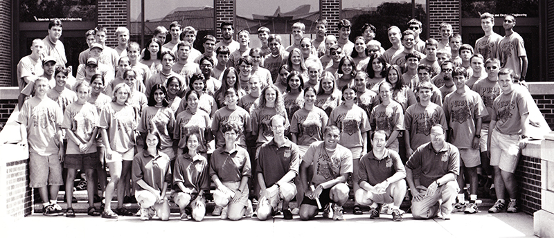 High school seniors pose on the steps of the Mechanical Engineering building.