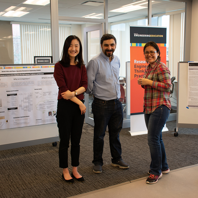 Rose poised in Wang Hall during a poster event