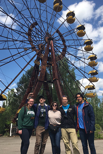Houghtalen at a ferris wheel in Chernobyl