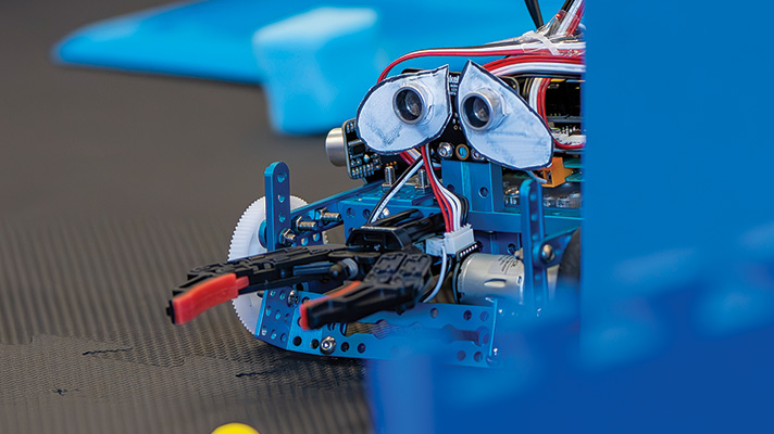 students looking at coaster